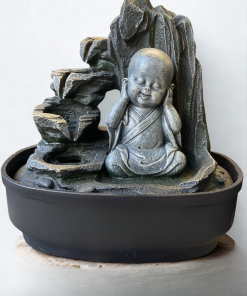 Fuente de agua buda sabio sordo